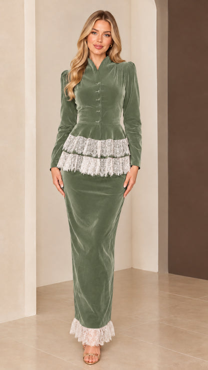 Full-length view of sage green velvet peplum maxi evening gown with lace details