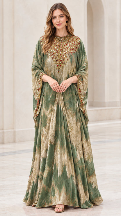 Model wearing Sage Green velvet maxi kaftan with jeweled neckline