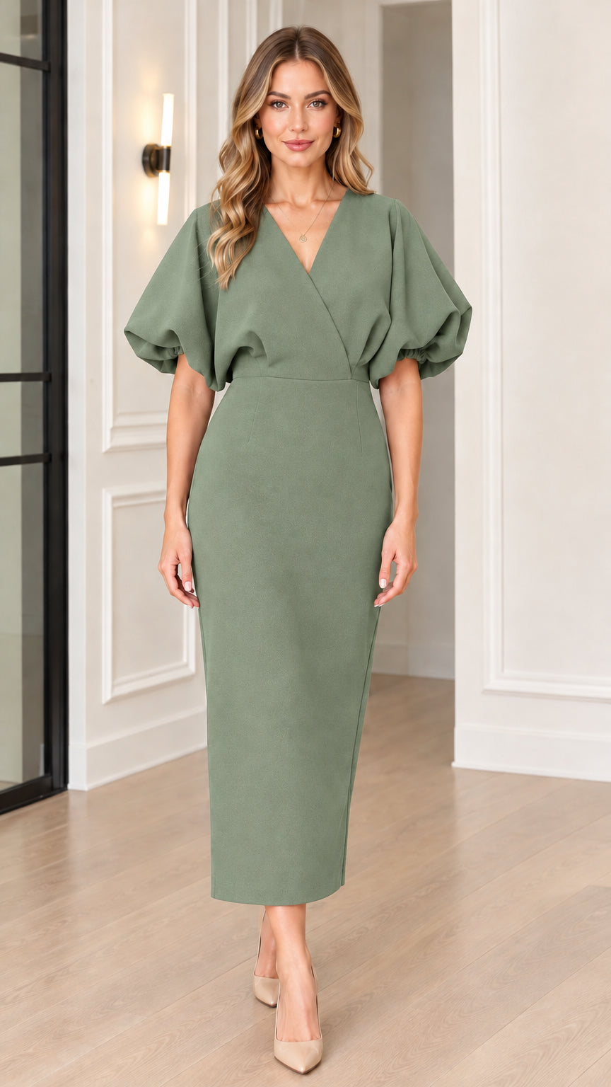 Front full view of woman wearing sage green V-neck puff sleeve midi sheath dress