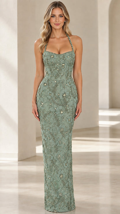 Front view of woman wearing Sage Green beaded halter evening gown