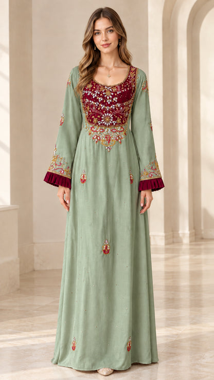 Full front view of model wearing Sage Green embroidered velvet yoke kaftan dress
