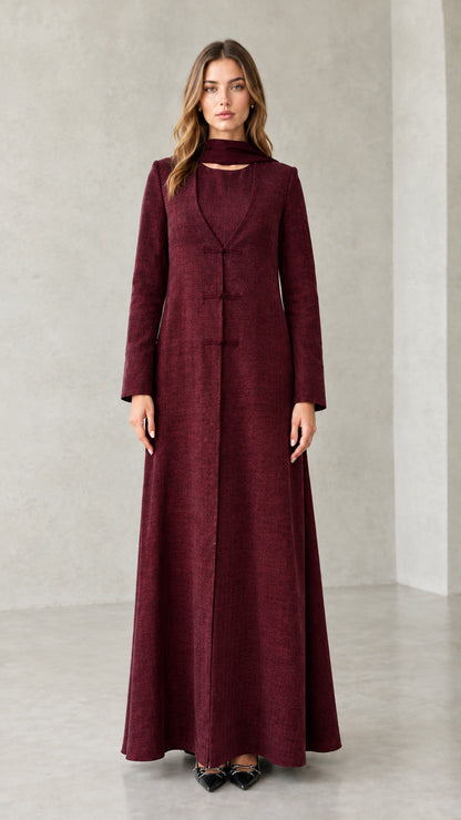 Front view of model wearing Burgundy textured long sleeve maxi coat dress