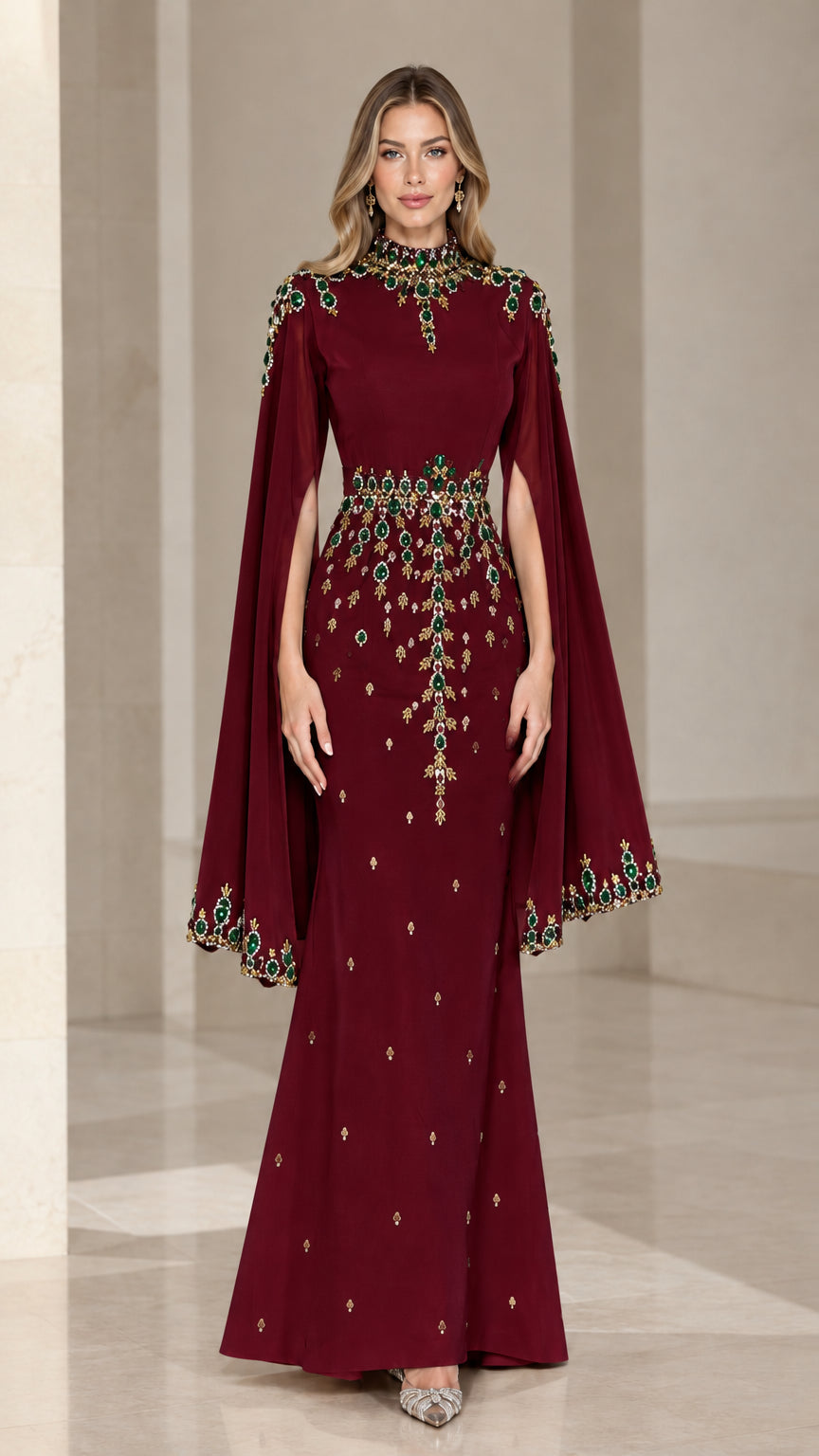 Front view of rich burgundy wine red jeweled cape maxi evening gown