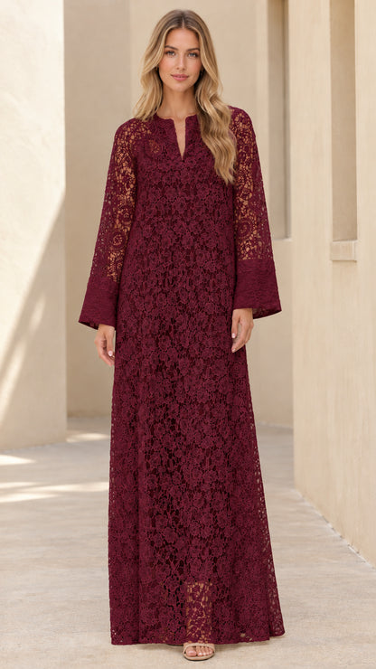Woman wearing burgundy wine red floral lace long sleeve maxi dress