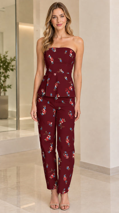 Full-length view of model wearing burgundy floral strapless peplum matching set