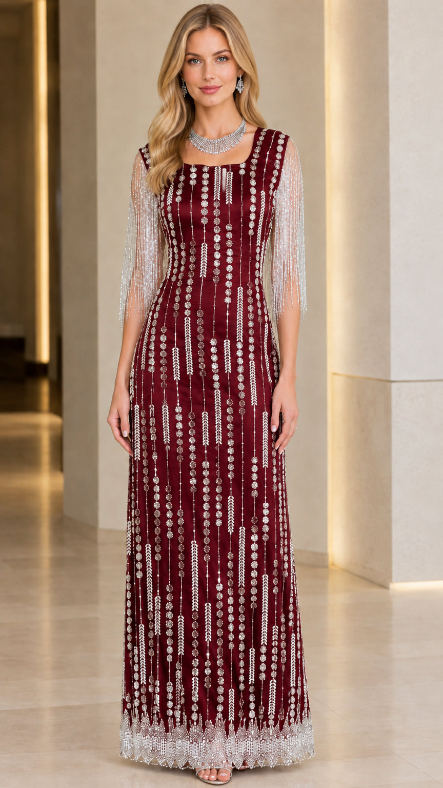 Front view of burgundy red embellished square neck evening dress with fringe details