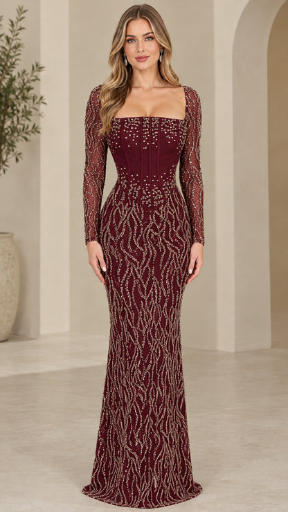 Front view of burgundy red long sleeve sequin corset gown