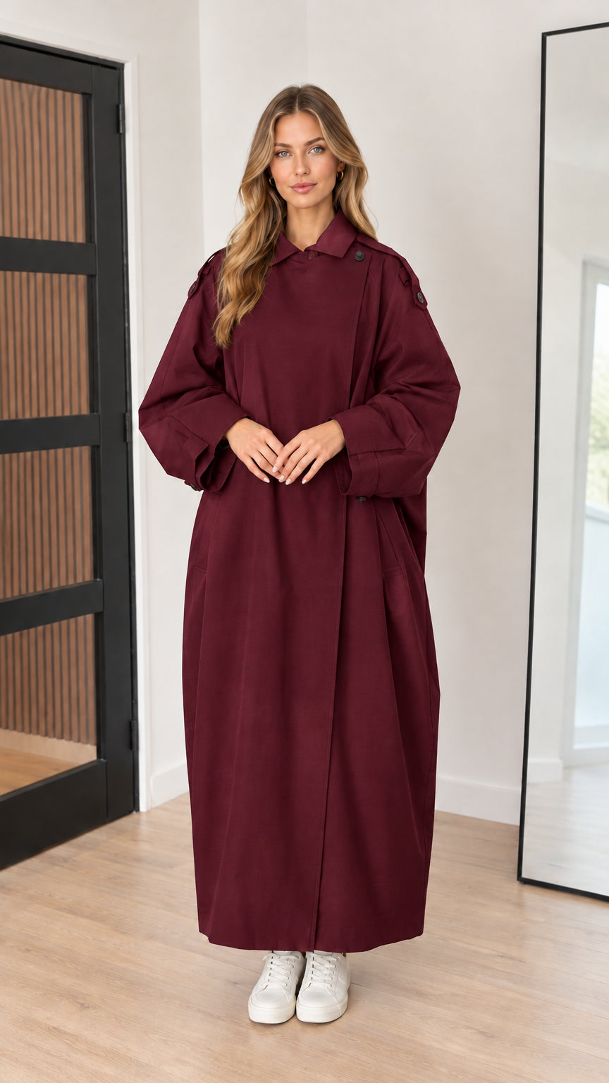 Full-length front view of burgundy wine oversized maxi trench coat on model
