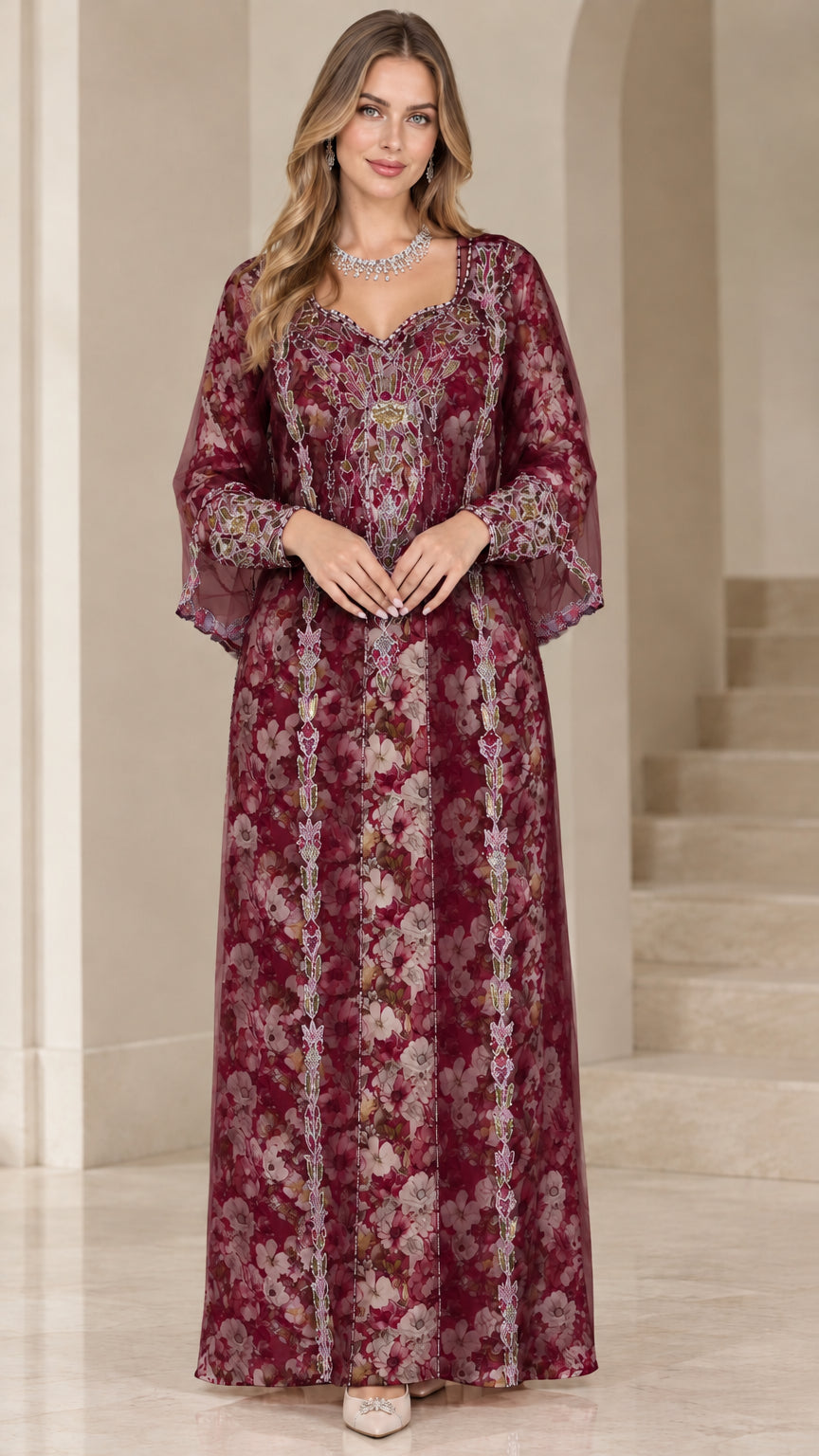 Front view of woman wearing burgundy floral embroidered kaftan maxi dress