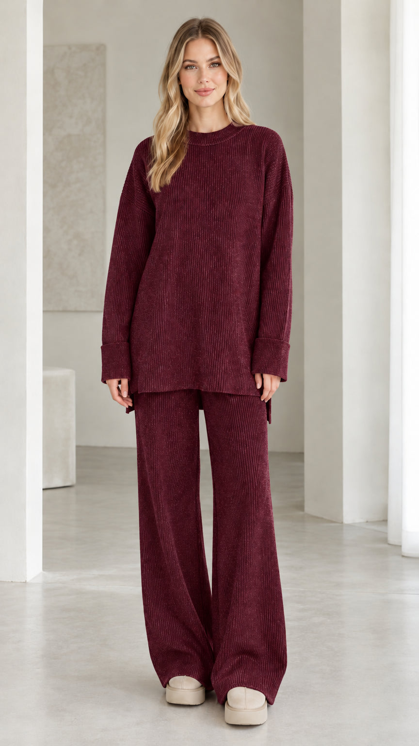 Model wearing burgundy ribbed knit two-piece lounge set