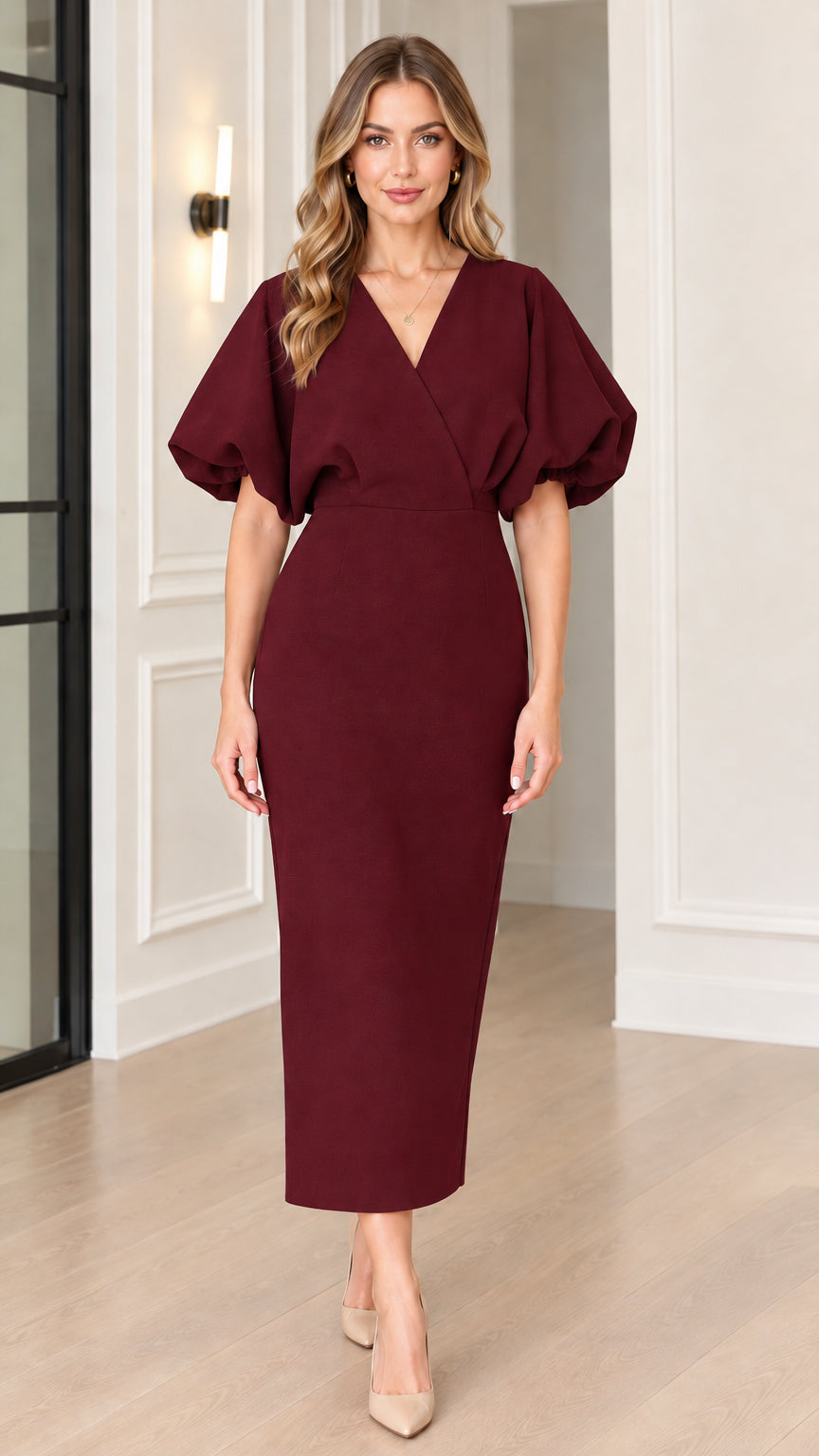 Front full view of woman wearing burgundy wine V-neck puff sleeve midi sheath dress