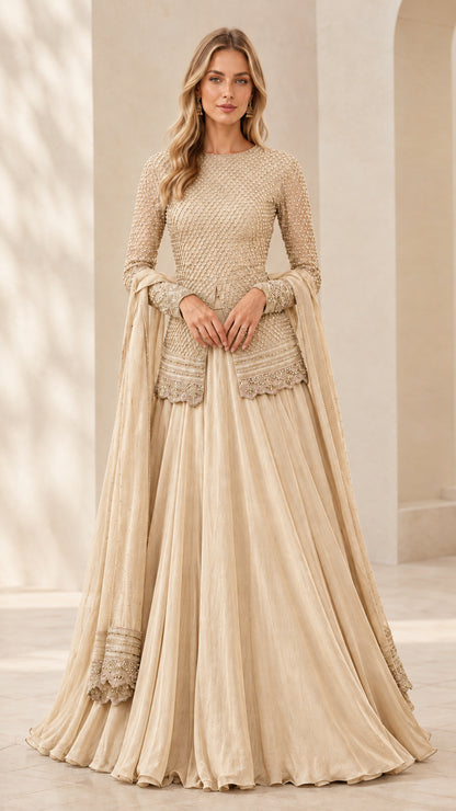 Front full view of champagne beige embellished long sleeve peplum top and pleated maxi skirt set