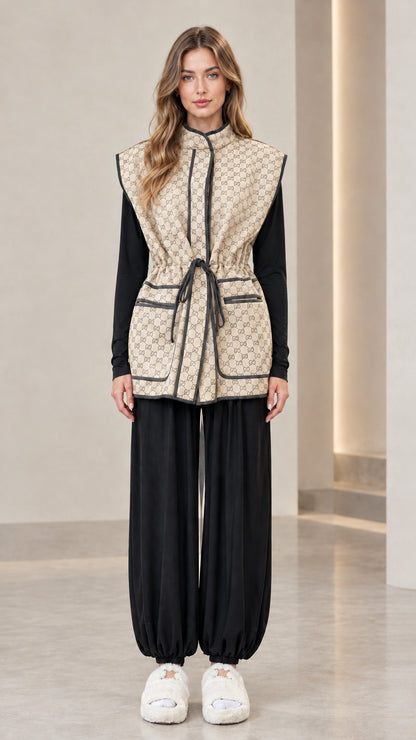 Full front view of woman wearing beige monogram drawstring waist vest