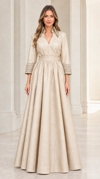 Front view of model wearing champagne gold embellished collar A-line ballgown