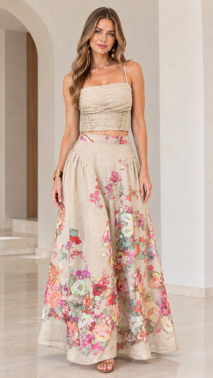 Full-length view of beige cream floral two-piece crop top and maxi skirt set