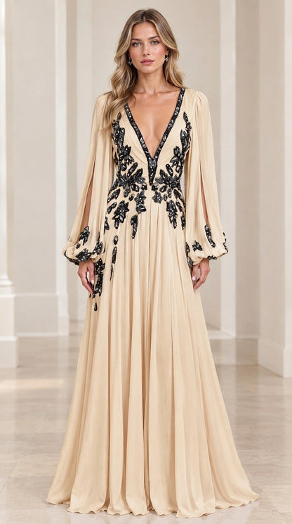 Model wearing champagne gold embroidered chiffon evening gown with slit sleeves