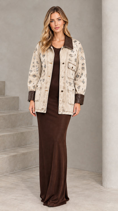 Front view of model wearing Beige embellished denim jacket with brown contrast trim