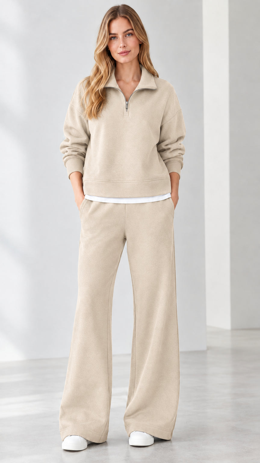 Front view of model wearing beige oatmeal half-zip loungewear set